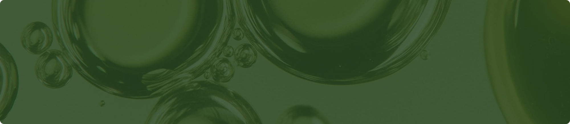 Botanical oil forming soft green ripples